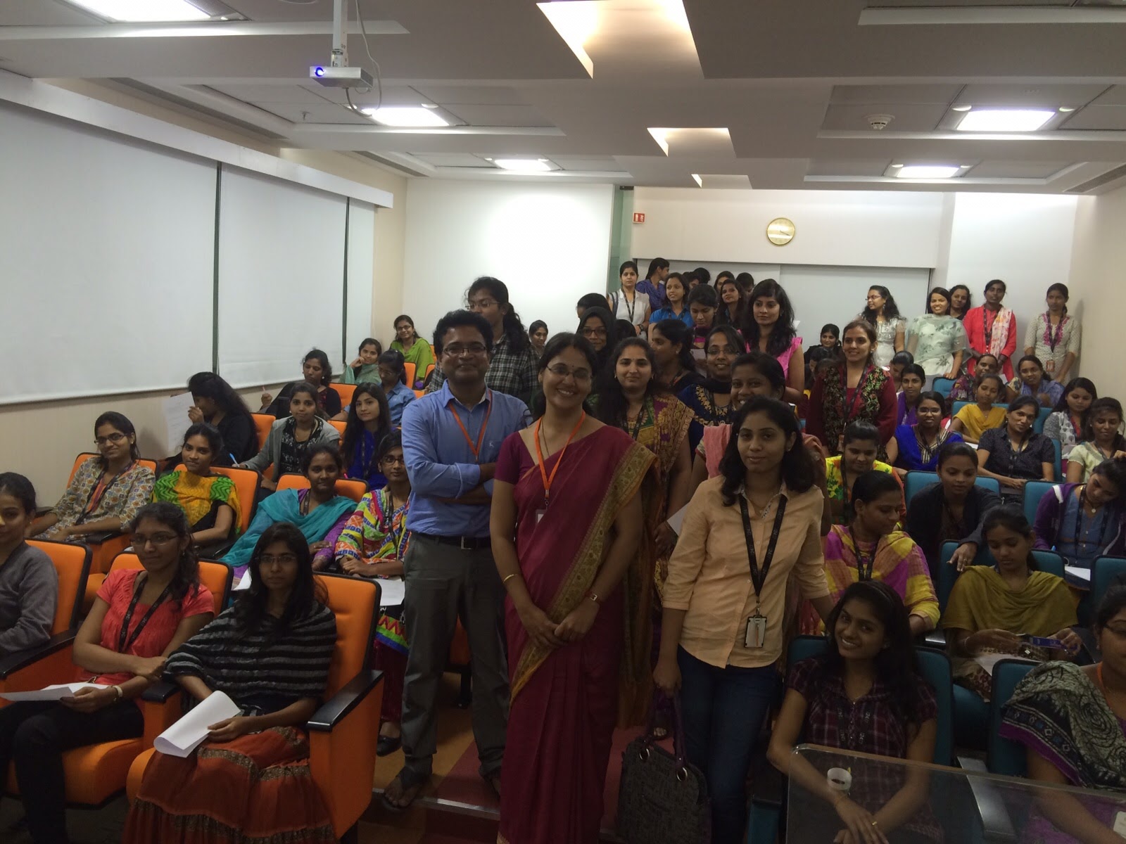 Dr. Suresh in a classroom lecture hall with 45+ students and educators